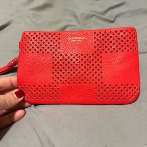 Isaac Mizrahi wristlet in like new condition.